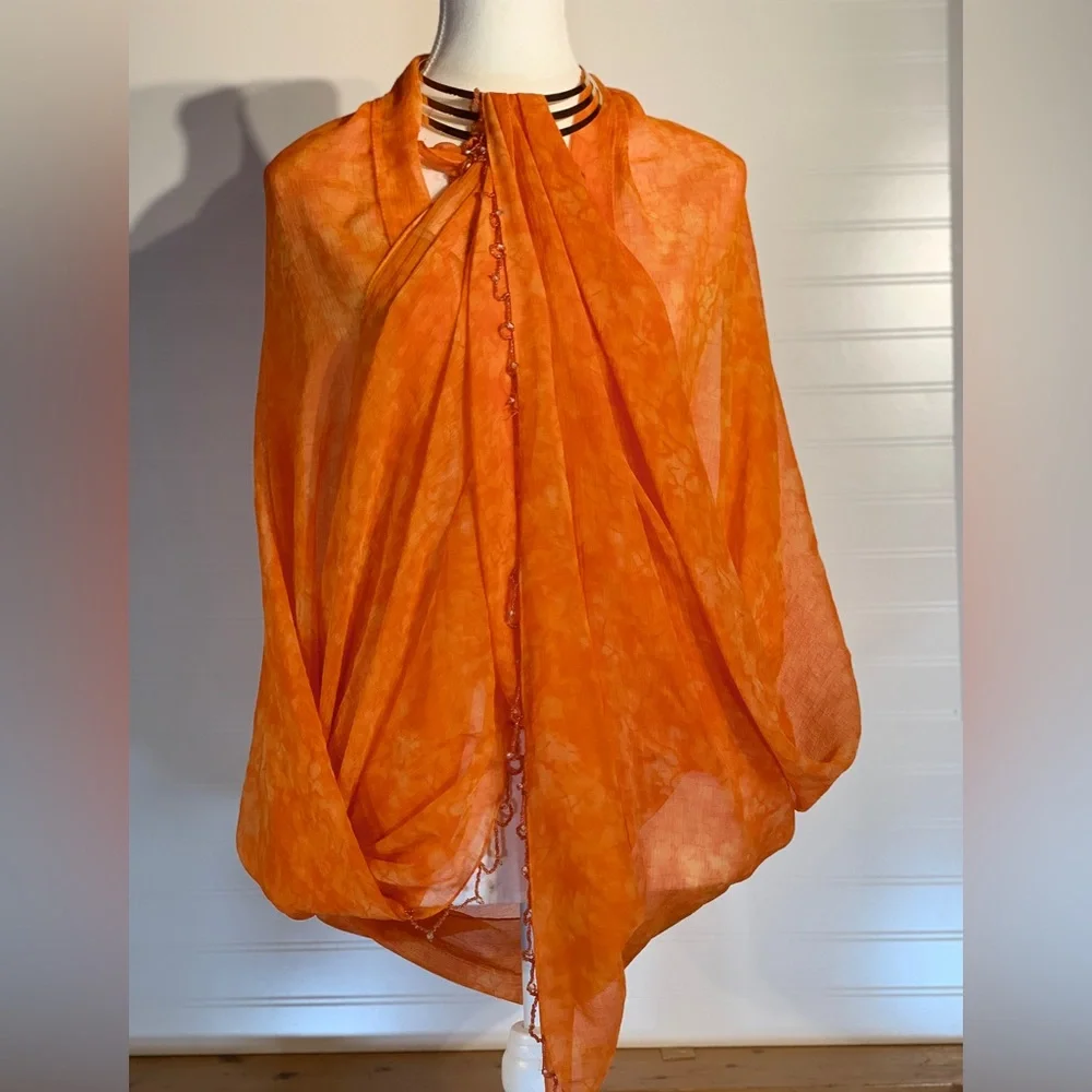 2 beautiful orange scarves‎ bundled. One with beading, then other with sparkle.